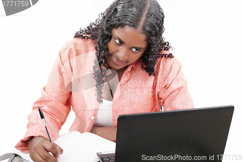 Image of happy african college student studying
