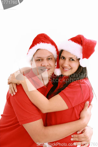 Image of Happy christmas couple. Isolated over white background. 