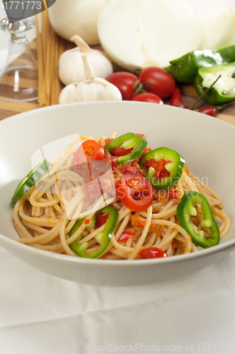 Image of spicy italian pasta tomato and chili peppers sauce