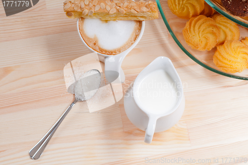 Image of fresh breakfast coffee and pastry