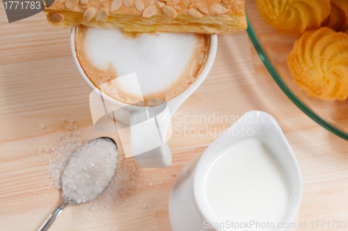 Image of fresh breakfast coffee and pastry