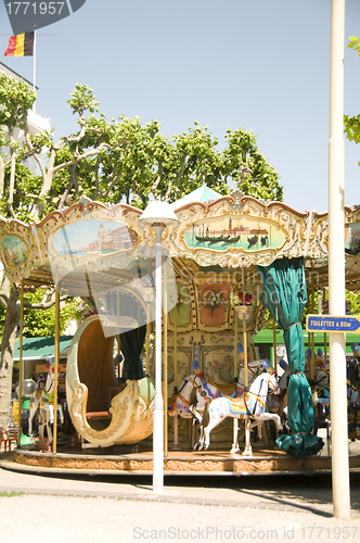 Image of old fashioned carousel in Cannes France French Riviera