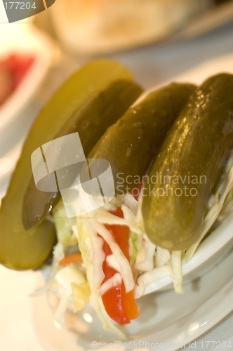 Image of pickles and cole slaw