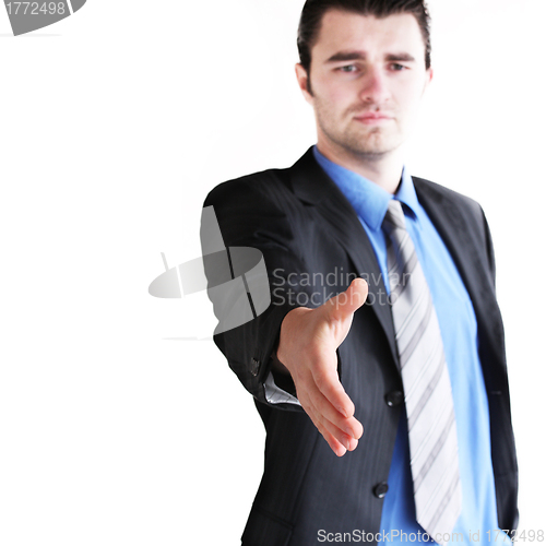 Image of young man giving hand vor handshake,isolated