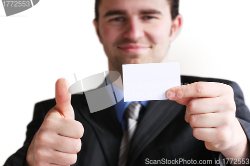 Image of Business card in hand