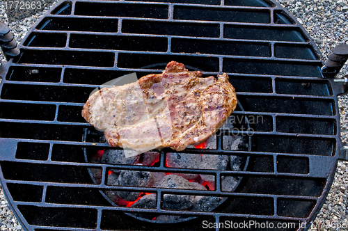 Image of roasted pork neck on barbecue