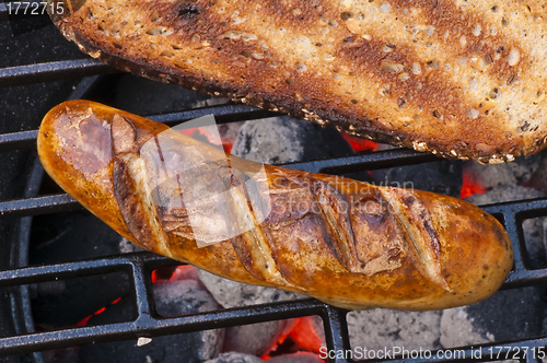 Image of roasted sausage on barbecue