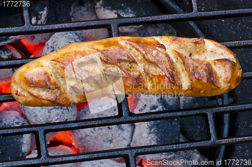 Image of roasted sausage on barbecue