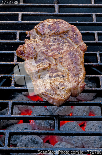 Image of roasted pork neck on barbecue