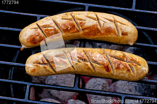 Image of roasted sausage on barbecue