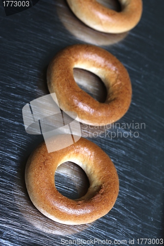 Image of pastry rings on a steel plate
