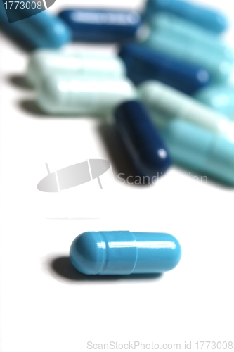 Image of colored isolated medicinical capsules