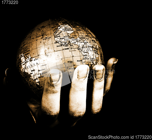 Image of Globe in a girl's hands