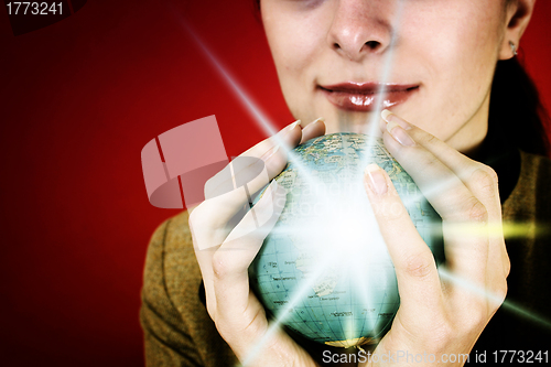 Image of Globe in a girl's hands