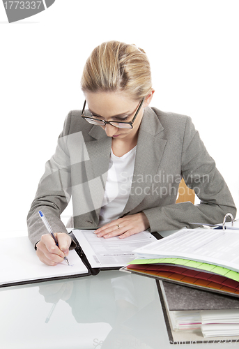 Image of business woman with folders on desk office