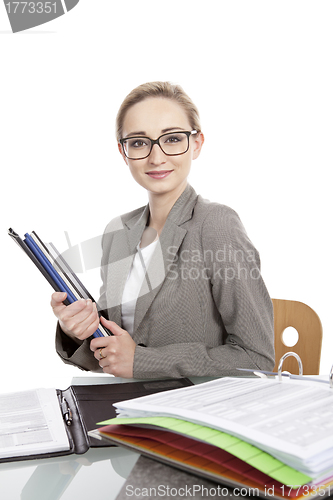 Image of business woman with folders on desk office