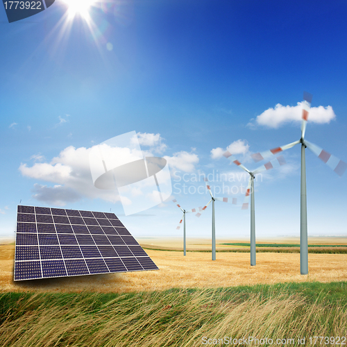 Image of Wind turbines and solar panels