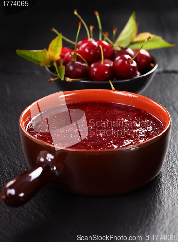 Image of Homemade cherry jam with wild strawberries