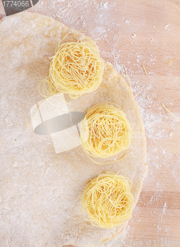 Image of Dough with raw noodles