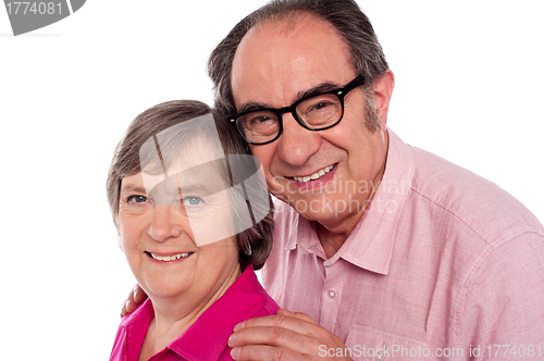 Image of Closeup portrait of smiling aged couple