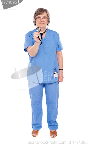 Image of Senior lady doctor posing with stethoscope