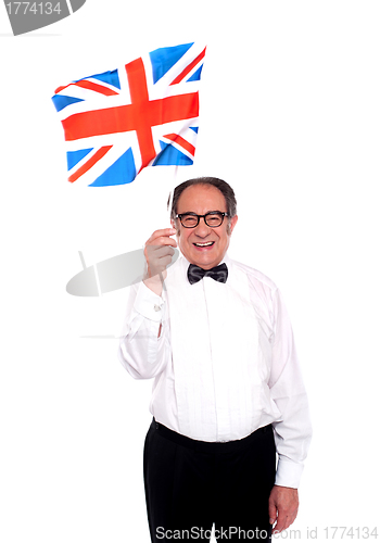 Image of Man cheering for United Kingdom. Waving flag