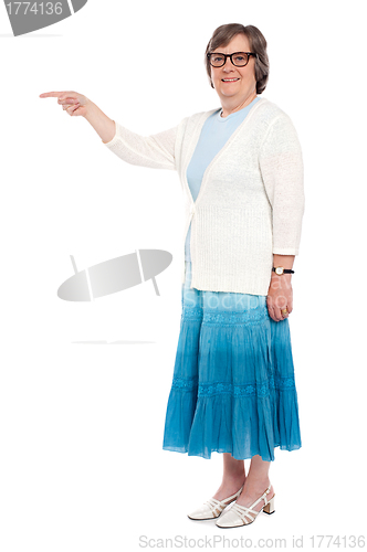 Image of Attractive woman indicating away