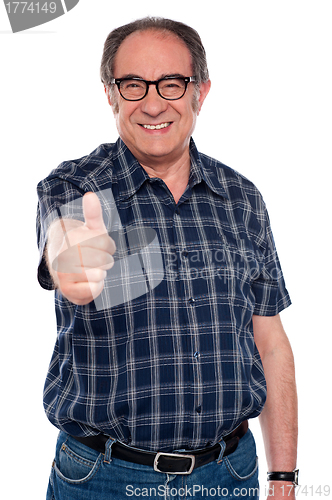 Image of Aged man gesturing thumbs up