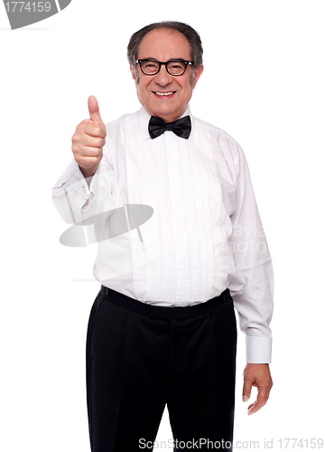 Image of Matured man showing thumbs up