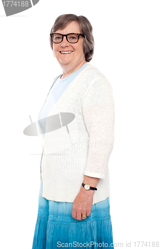 Image of Fashionable aged woman posing