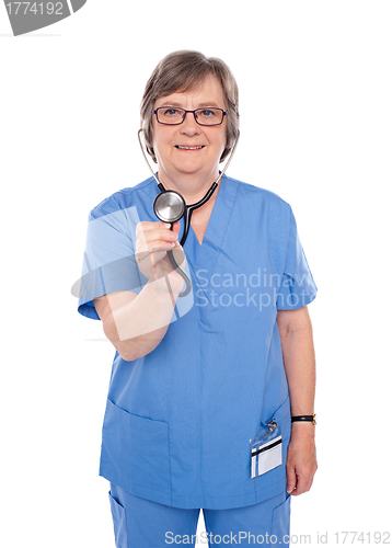 Image of Senior doctor checking your heartbeats