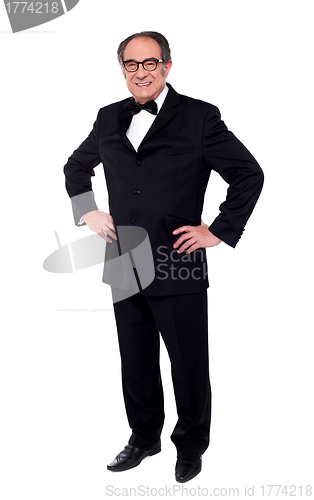 Image of Studio shot of a stylish old man posing