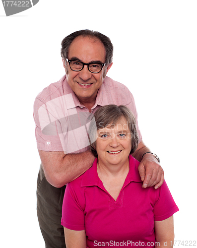 Image of Lovely family posing for a photo shot, in studio