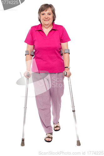 Image of Full length portrait of an injured senior woman