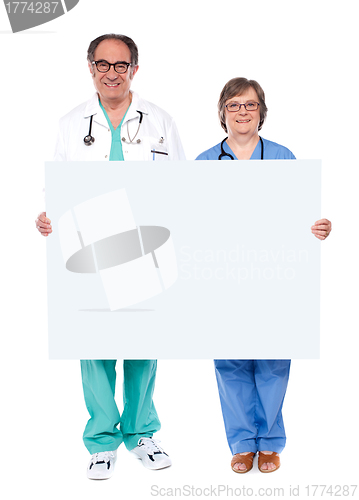 Image of Medical professionals showing blank billboard