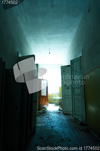 Image of Doorway with bright light in an abandoned building