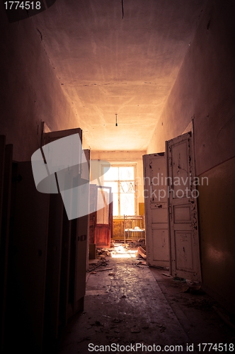 Image of Doorway with bright light in an abandoned building