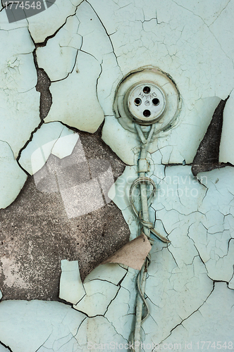 Image of Old plug on abandoned wall