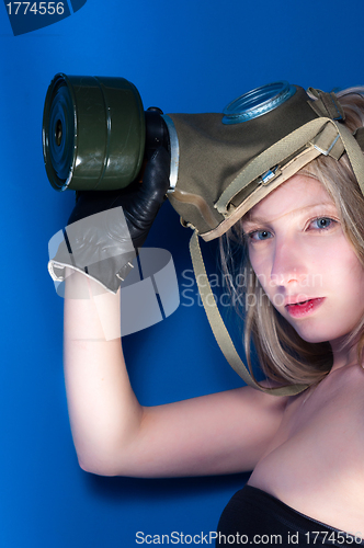 Image of Young woman with a mask closeup