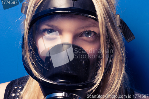 Image of Young woman with a mask