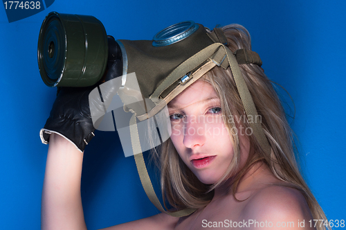 Image of Young woman with a mask closeup