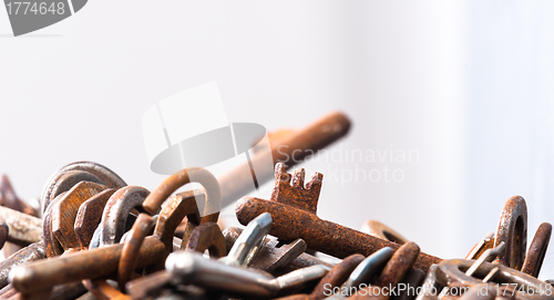 Image of A large group of rusty keys