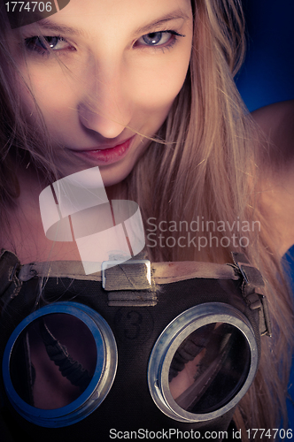 Image of Young woman with a mask