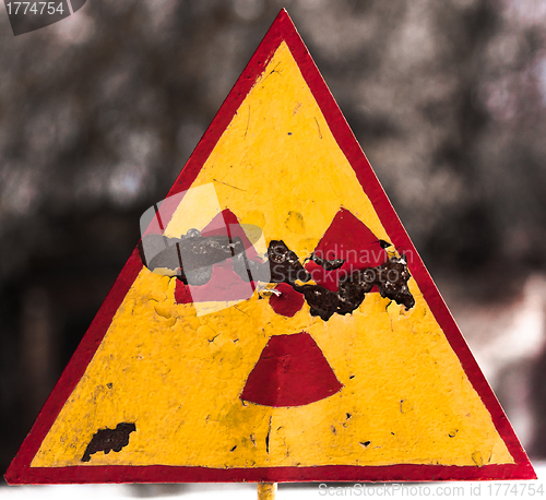 Image of Radioactivity symbol on blurry background