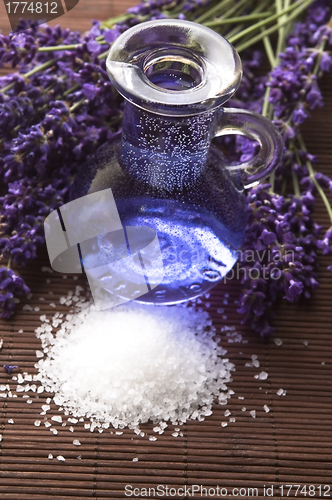 Image of Lavender flowers with the bath salt and essential oil