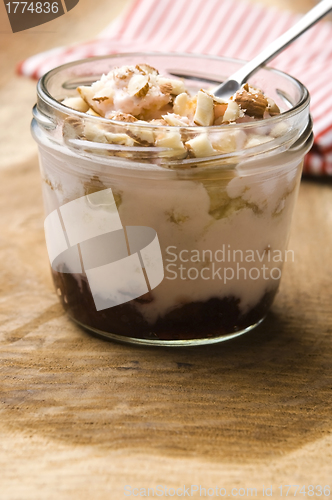 Image of Sweet dessert in glass jar - strawberry cake