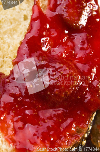 Image of Sweet bread ( challah ) with strawberry jam