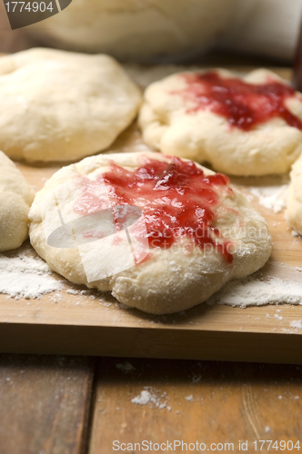 Image of Sweet doughnuts with rose marmelade