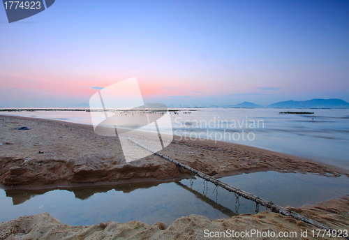 Image of Tropical sunset on the beach.