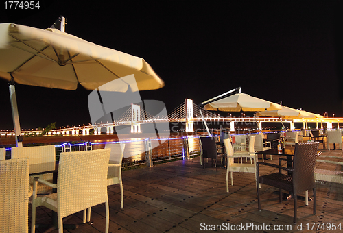 Image of Street cafe at night 